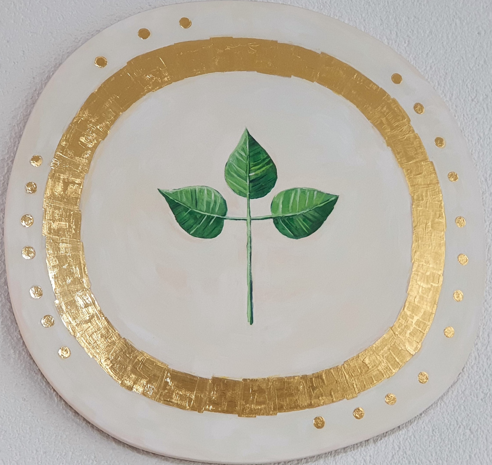 Sonnenring und Blätterzweig